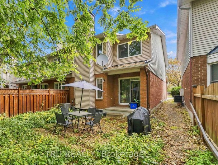Fenced backyard with no rear neighbours at Hunter's Glen Crescent