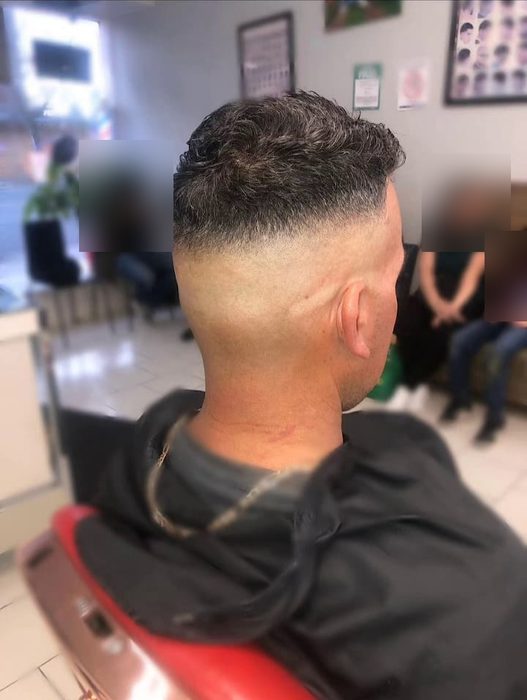 A finished skin fade, seen from behind