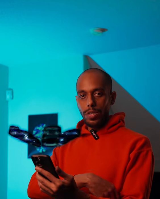 A 3D HUD effect tracked to his hand